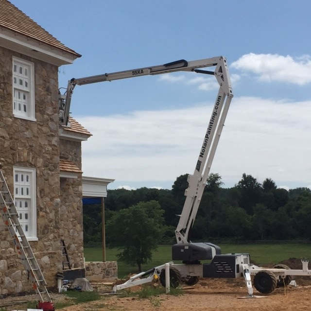 crane to paint exterior of home