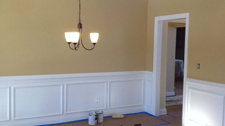 Nolan Painting Carpentry Team installs wainscoting in dining room